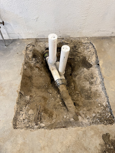 Negocio Levine & Sons Plumbing, Heating & Ac